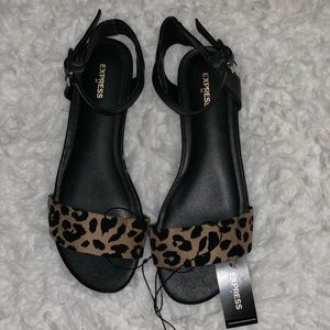 🆕 Express Sandals Size 7 Color: Black with animal print on wide band